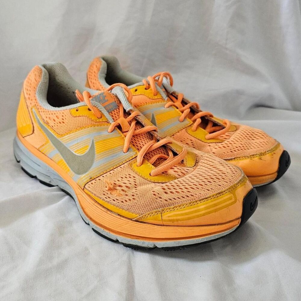orange Nike casual athletic athleisure sneakers